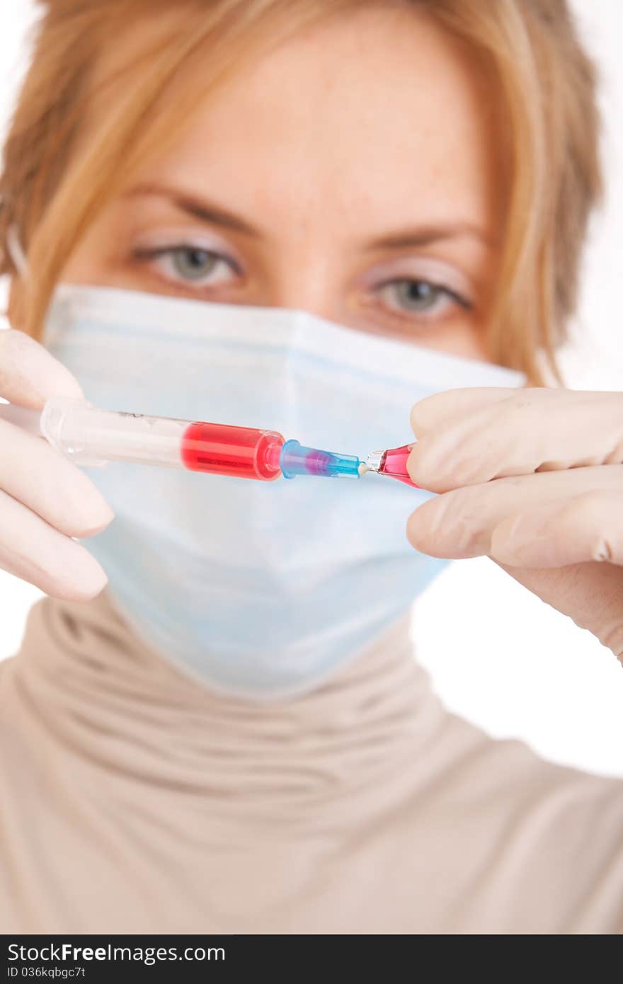 Medical syringe in hands