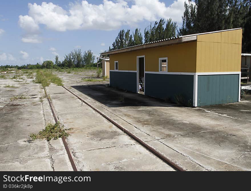 Modern day American ghost town by the train tracks. Modern day American ghost town by the train tracks.