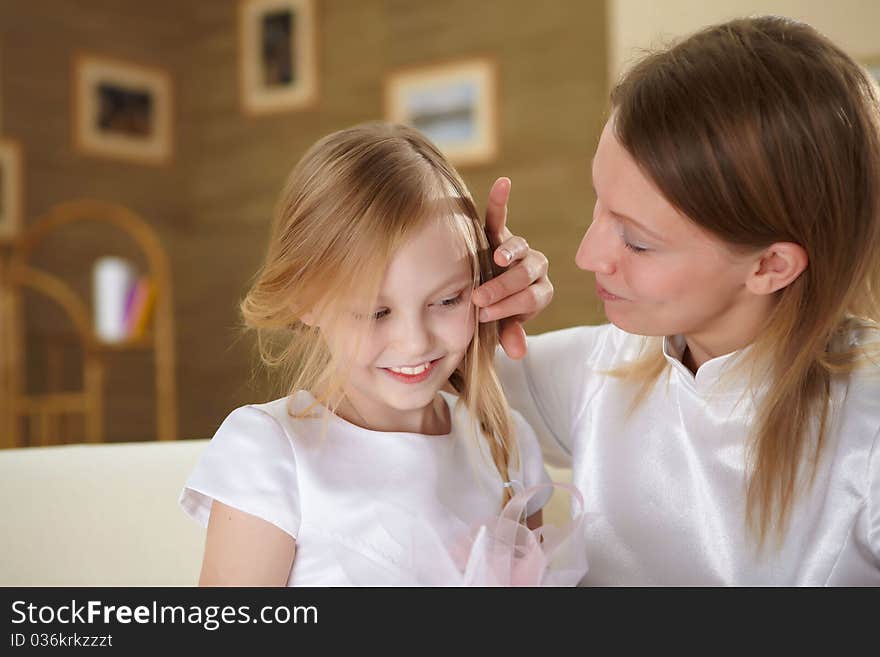 Mother with teenager daughter at home