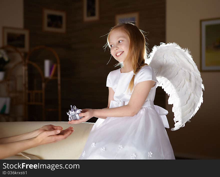 Girl In White Dressed As An Angel