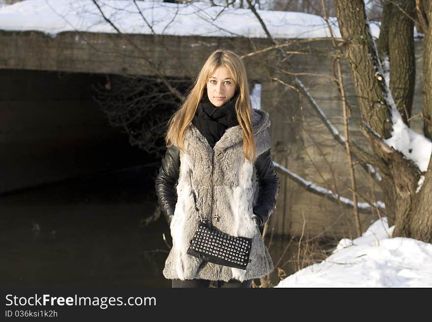 Girl in winter forest