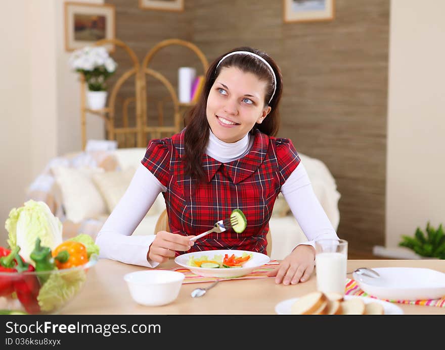 A Young Girl Cooking At Home