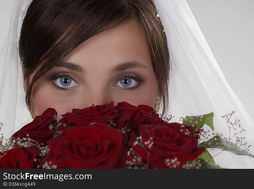 Bride in studio on light background. Bride in studio on light background