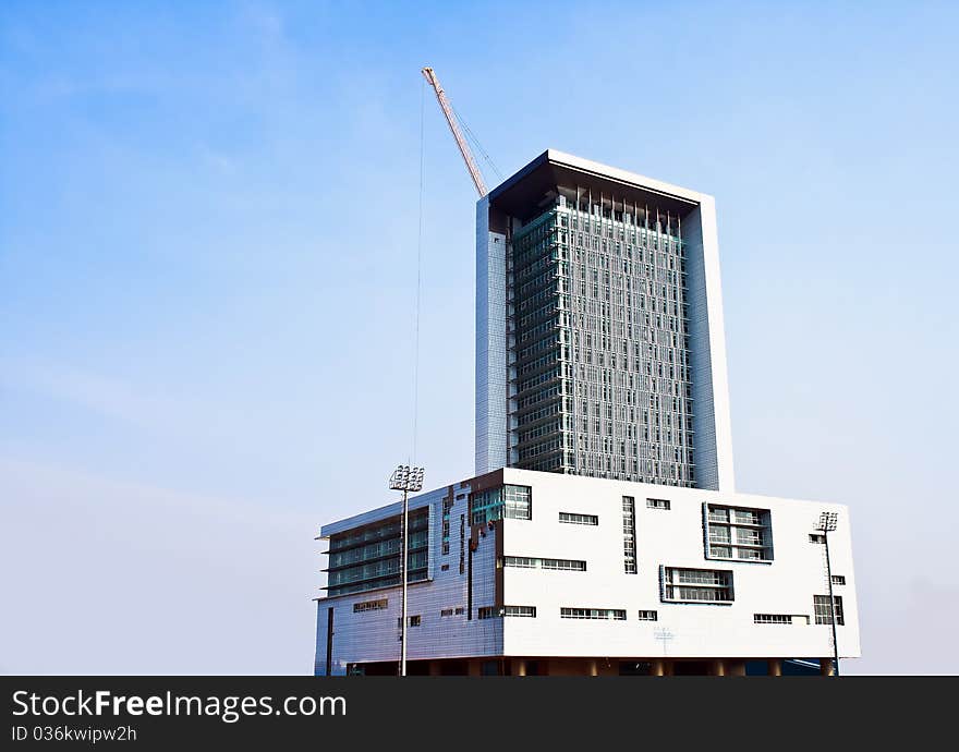 Crane and building under construction on the skyline