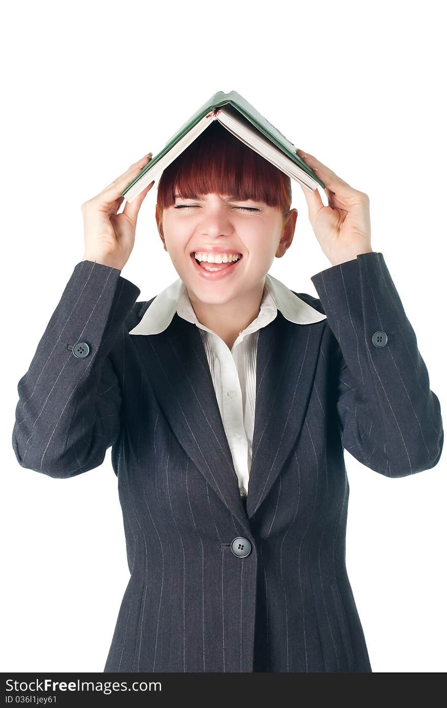 Crying business woman with notebook on the head