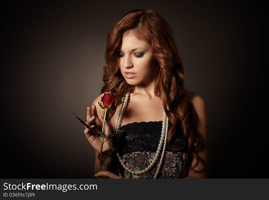 Portrait of beauty girl with rose