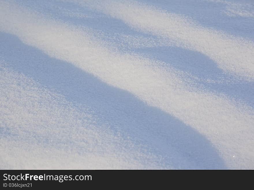 Light and shadow of the surface of snow. Light and shadow of the surface of snow