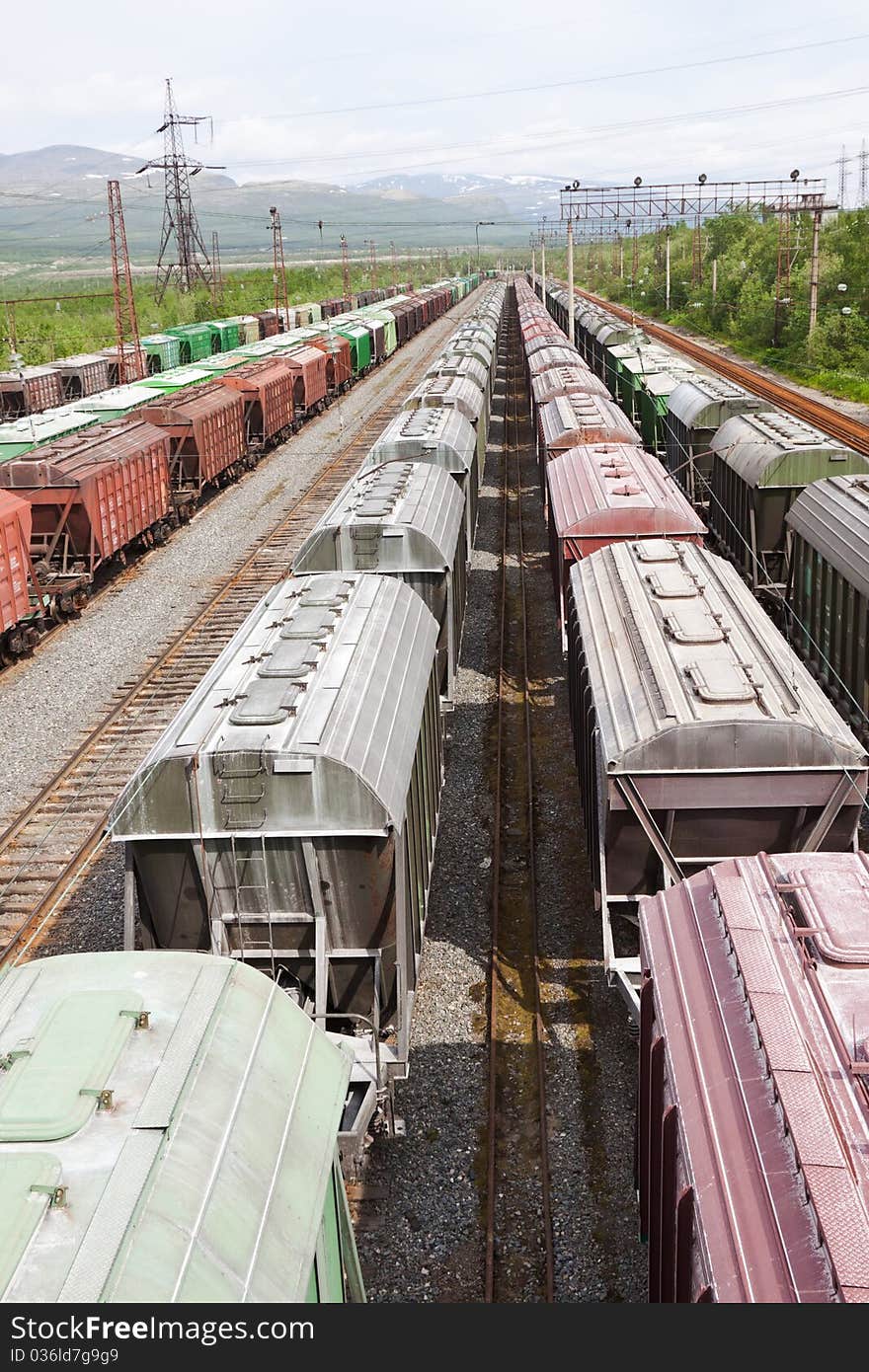 Range of multicoloured rail road waggons