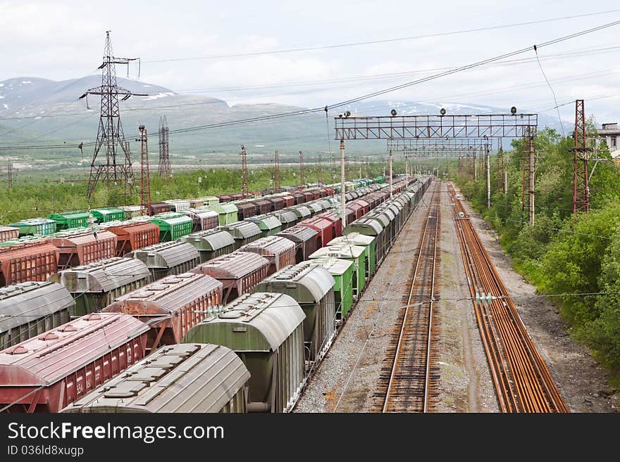 Range of multicoloured rail road waggons