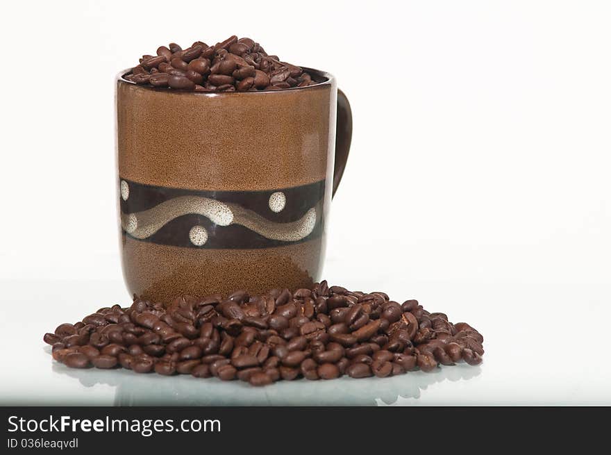 Coffee beans in a mug