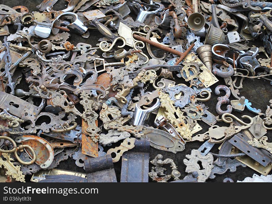 Spread collection of old keyholes, knobs, and hinges. Spread collection of old keyholes, knobs, and hinges