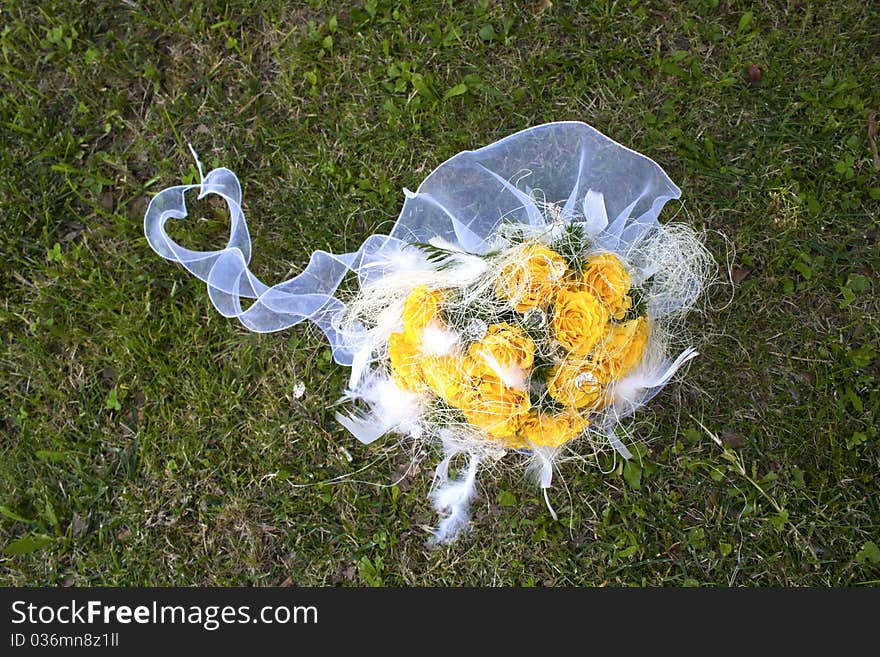 Bunch of flowers laid on the grass. Bunch of flowers laid on the grass