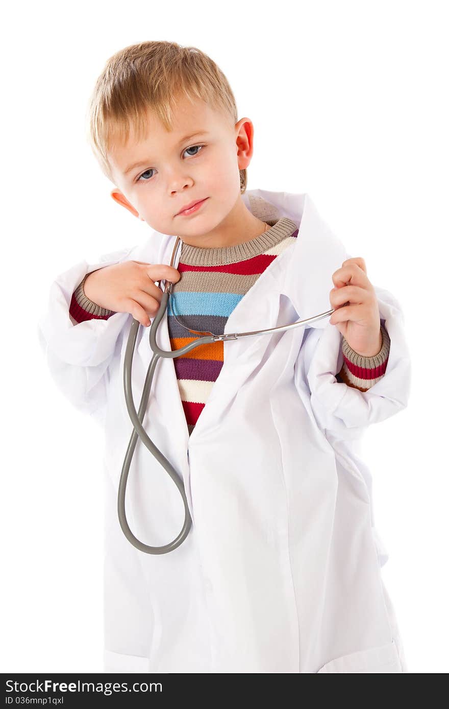 A cute boy is portraying a doctor. isolated on a white background