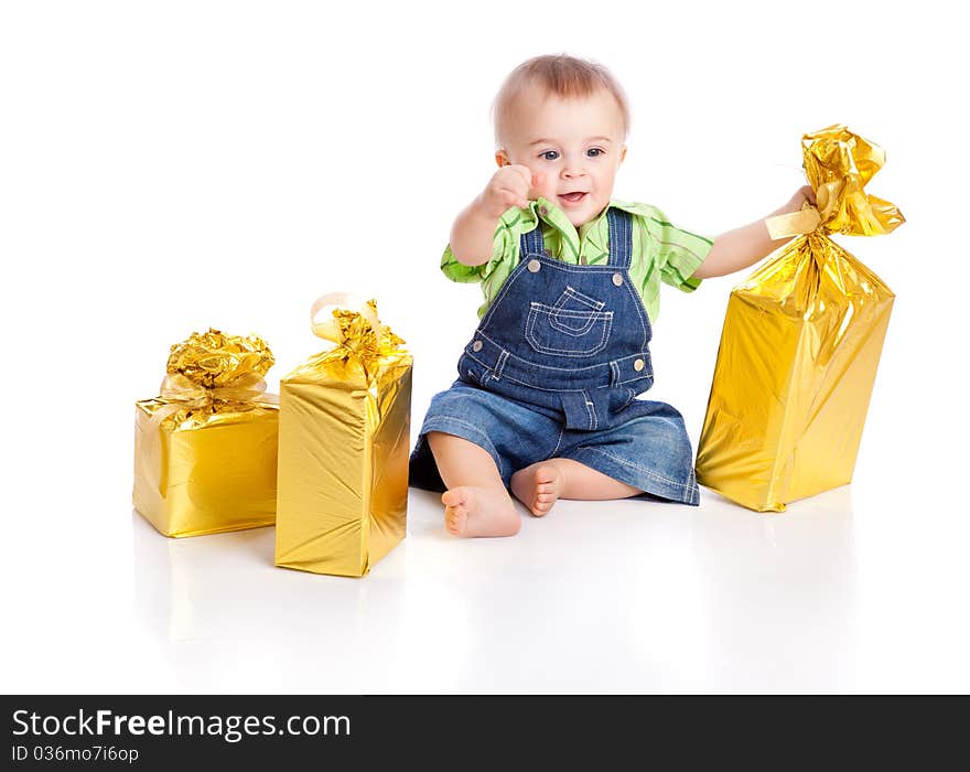 Small boy with three gifts in bright packaging