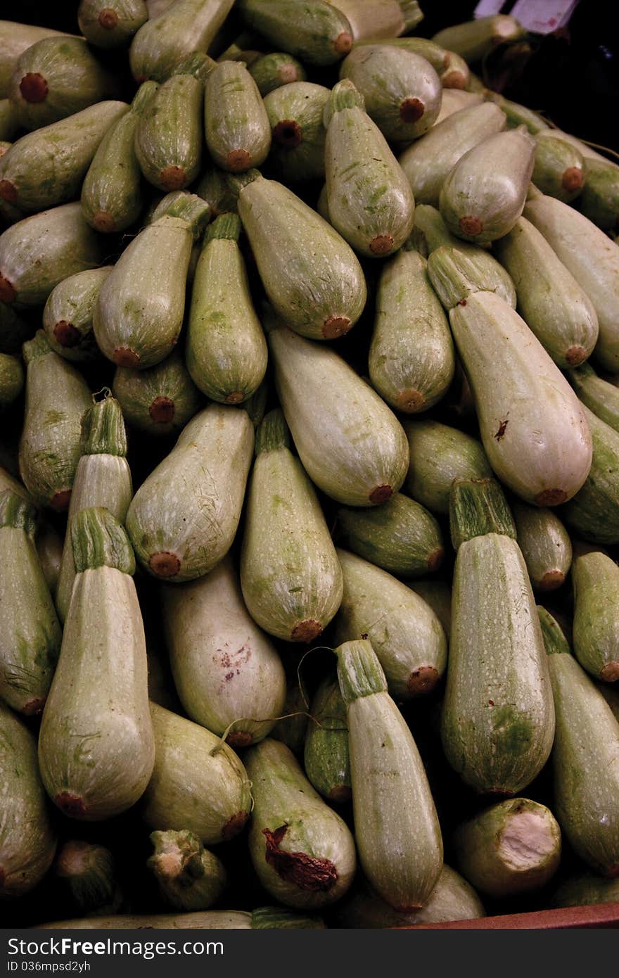 Zucchini on a market stand. waiting to be bought and cooked in the best Italian tradition.