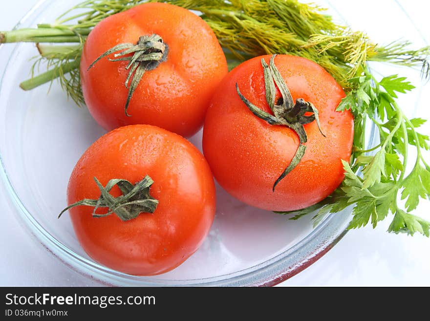 Group of three tomatoes. Red color