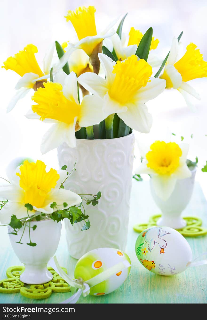 Narcissus in vase and easter eggs