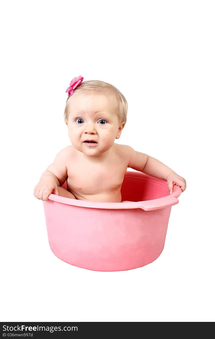 Disturbance small child having bath in pink tub isolated