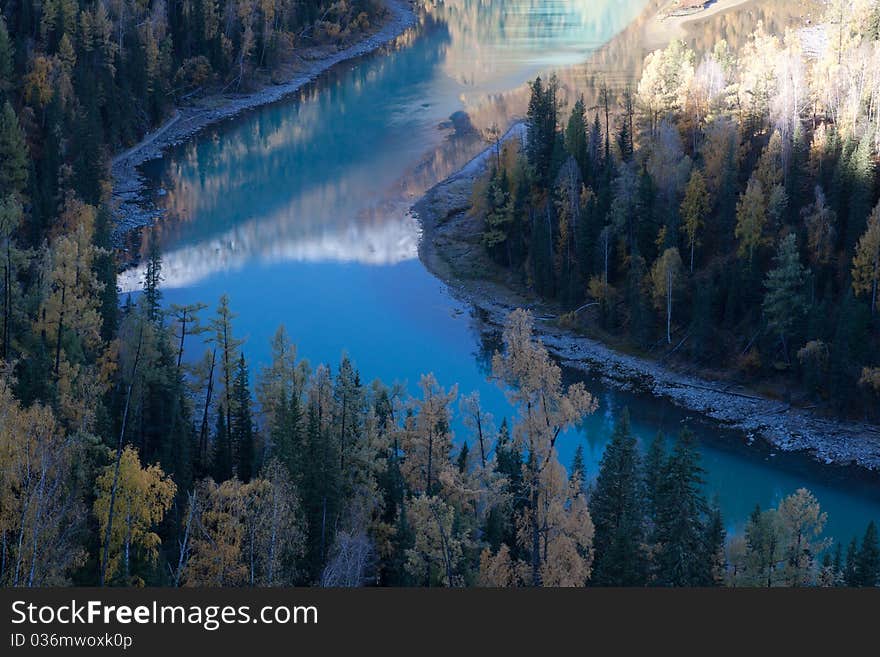 Sky blue river and trees, Kanas, xinjiang