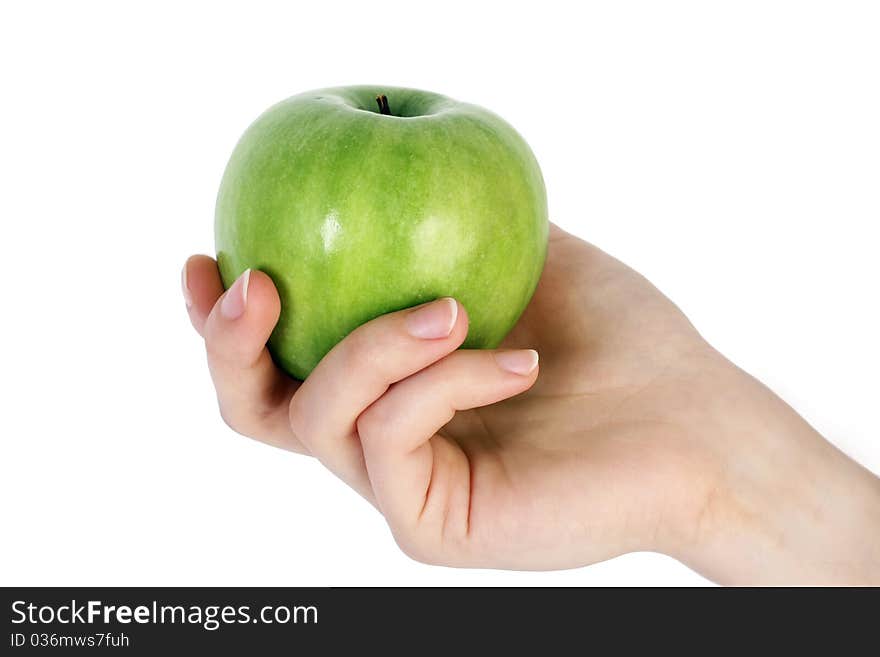 Green apple on hand isolated on white background