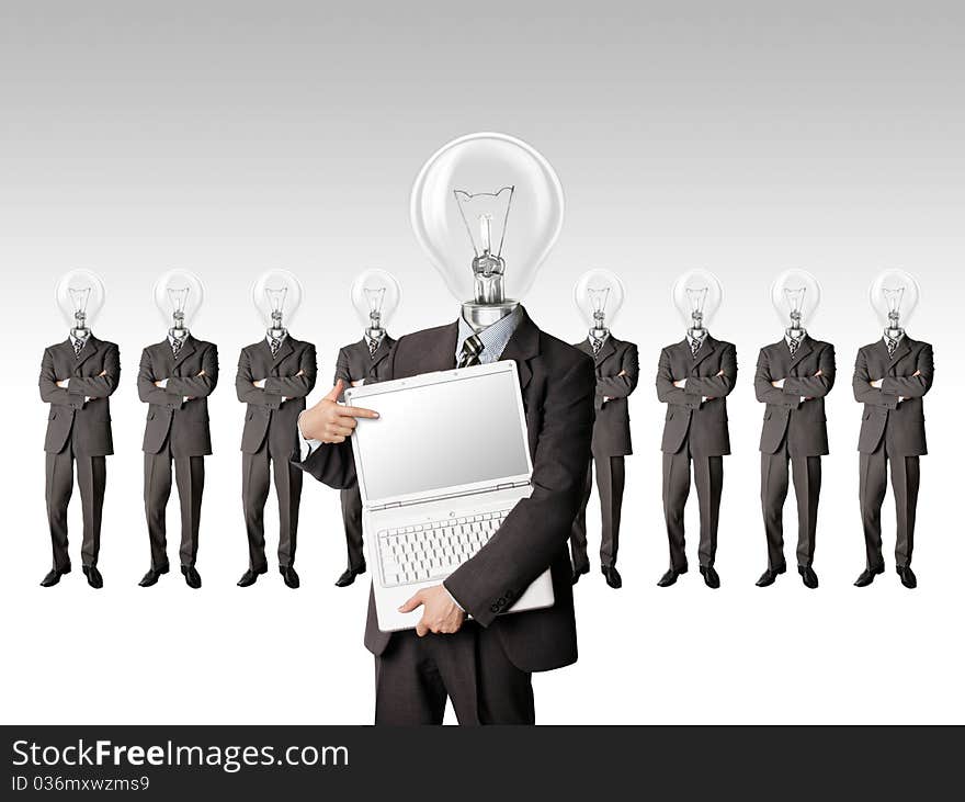 Male businessman with lamp-head and laptop have got an idea. Male businessman with lamp-head and laptop have got an idea