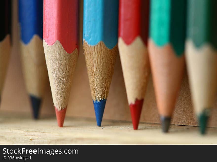 Background-color close-up image of a pencil. Background-color close-up image of a pencil