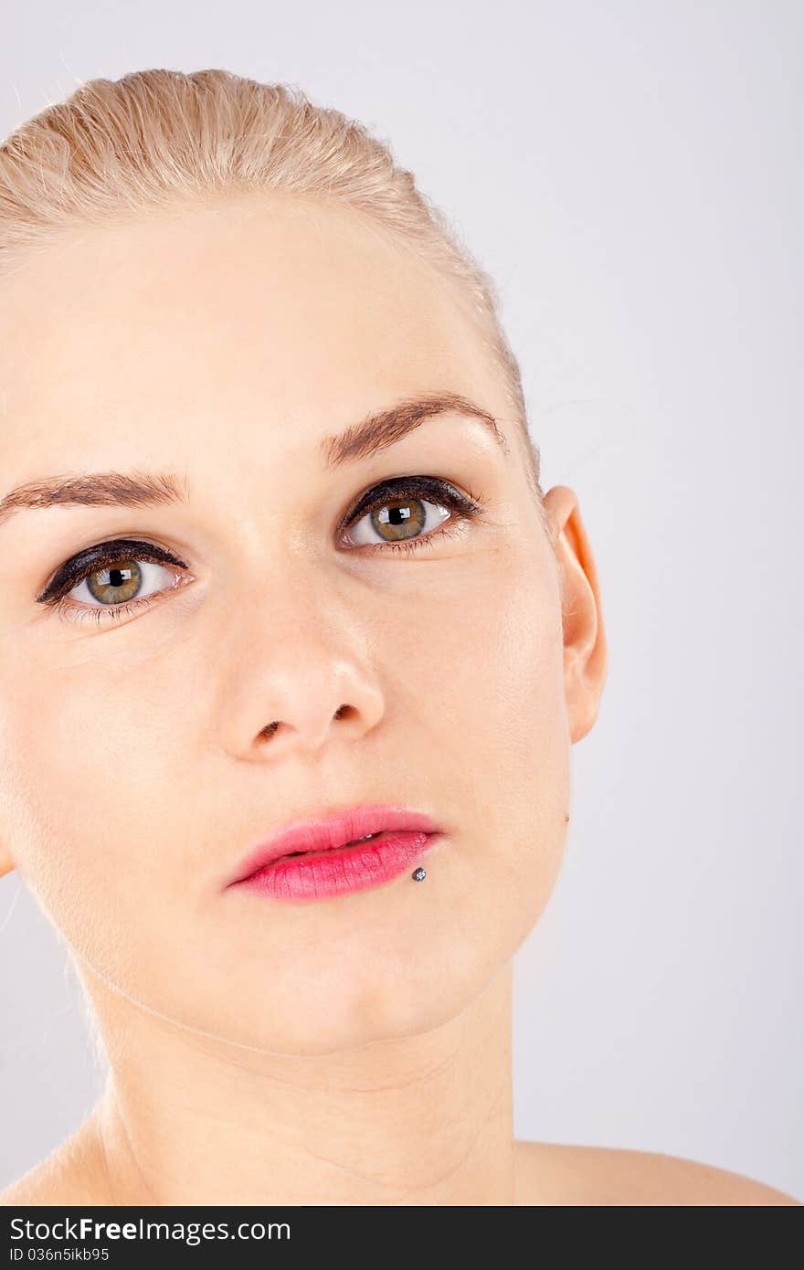 Close up of a beautiful blonde woman, smooth skin. Close up of a beautiful blonde woman, smooth skin