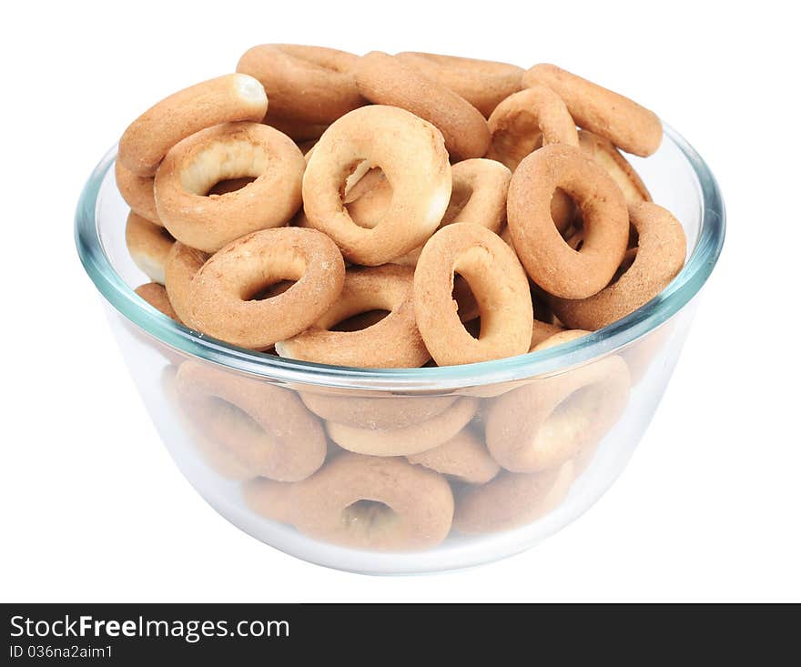 Bagels in a glass plate isolated on white background. Bagels in a glass plate isolated on white background