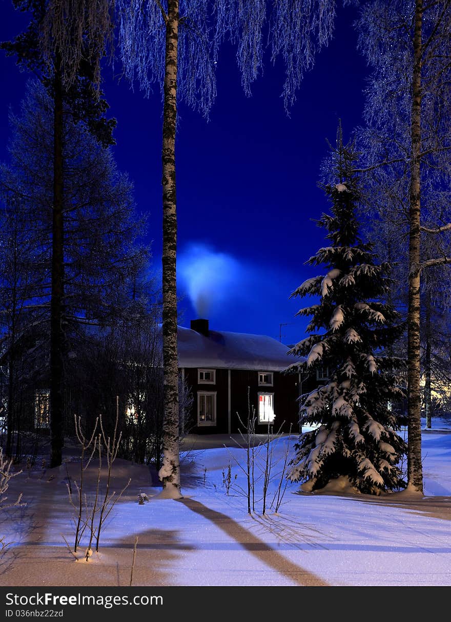 An old house in the cold winter night. An old house in the cold winter night