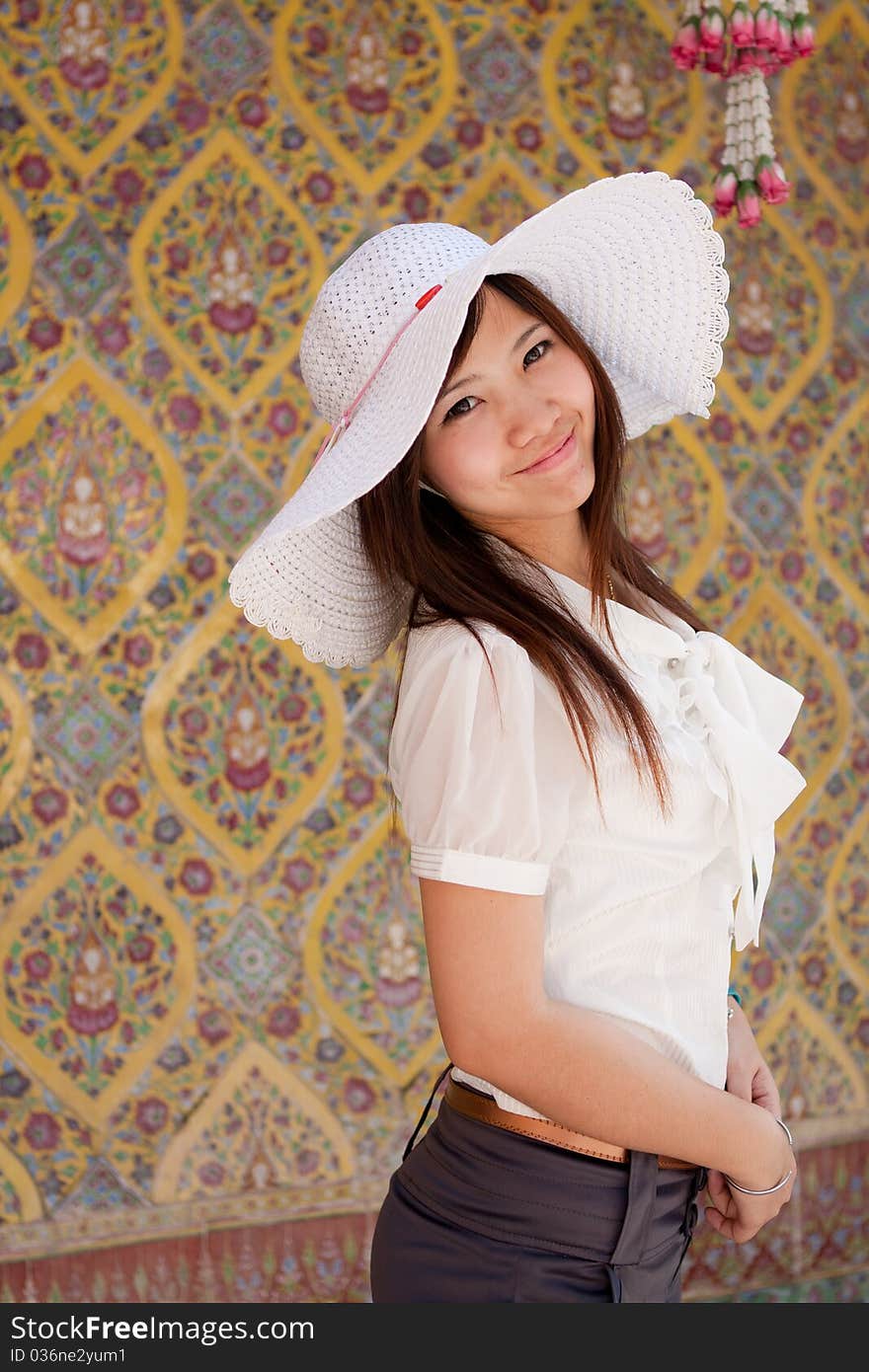 Smiling Young Woman. On Background