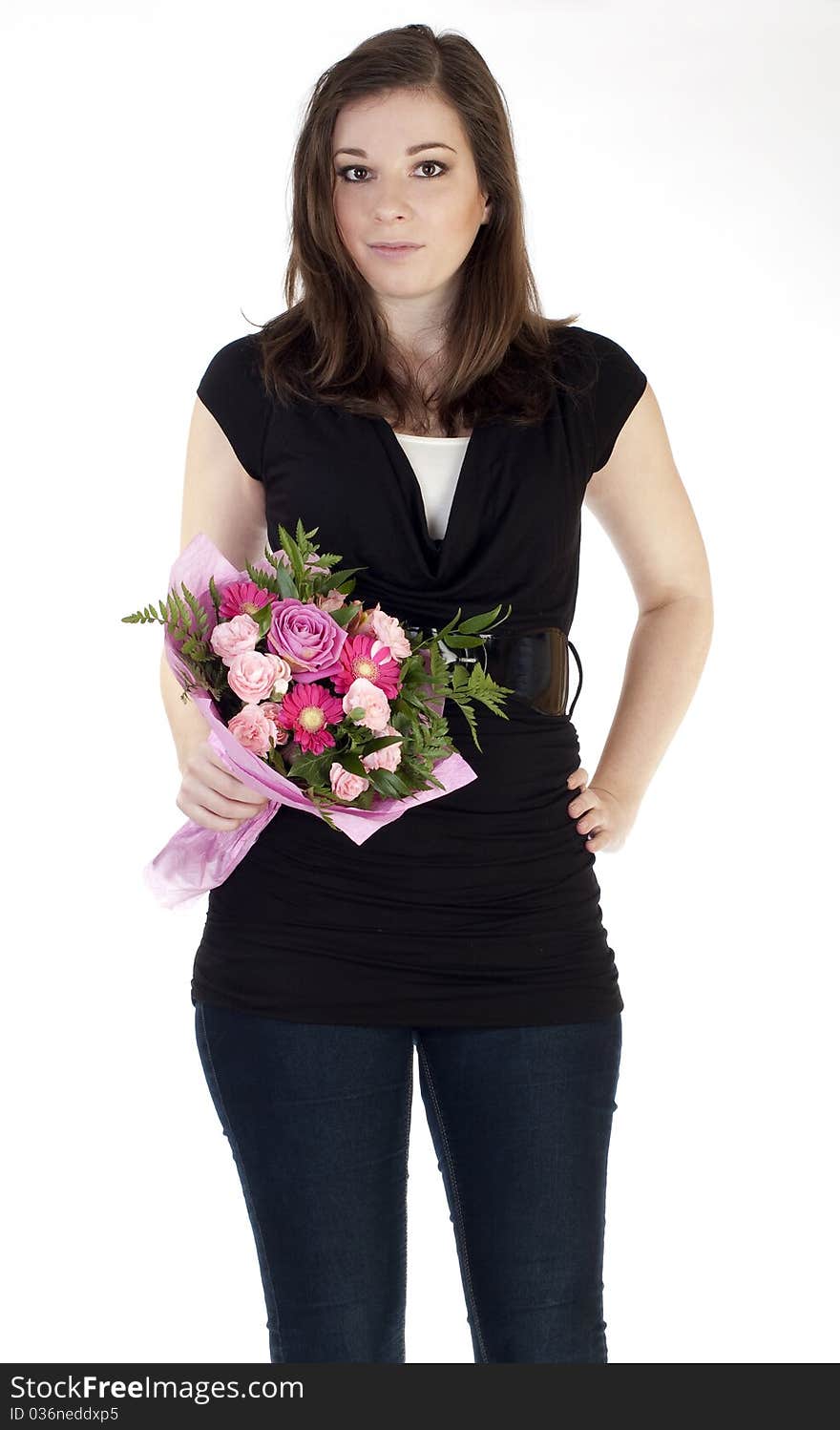 Young beautiful woman holding flowers