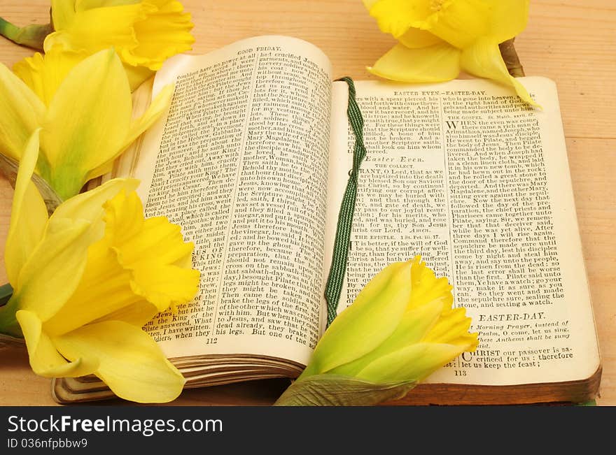 Prayer book and daffodils