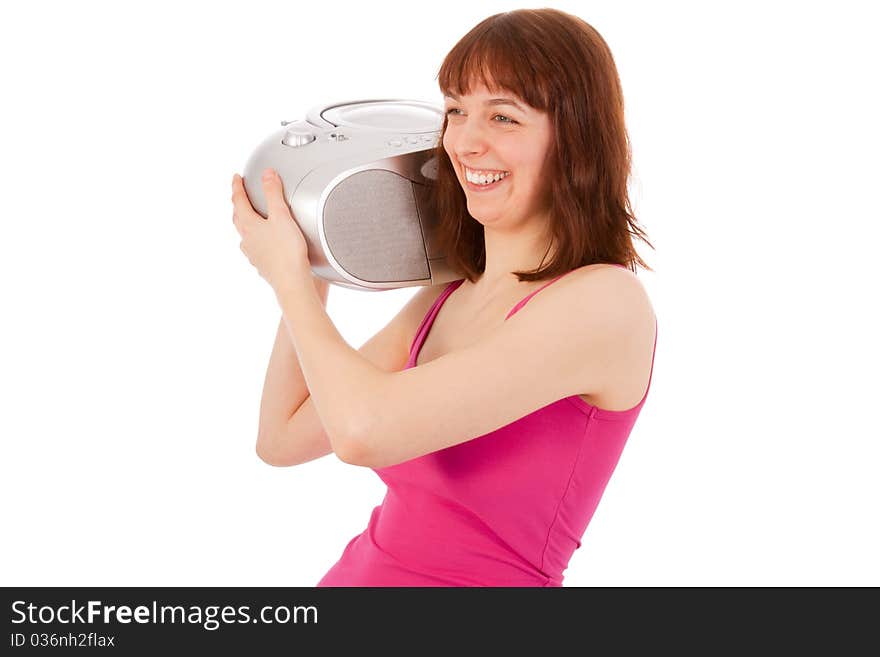 A young beautiful woman is listening to music with a cd player