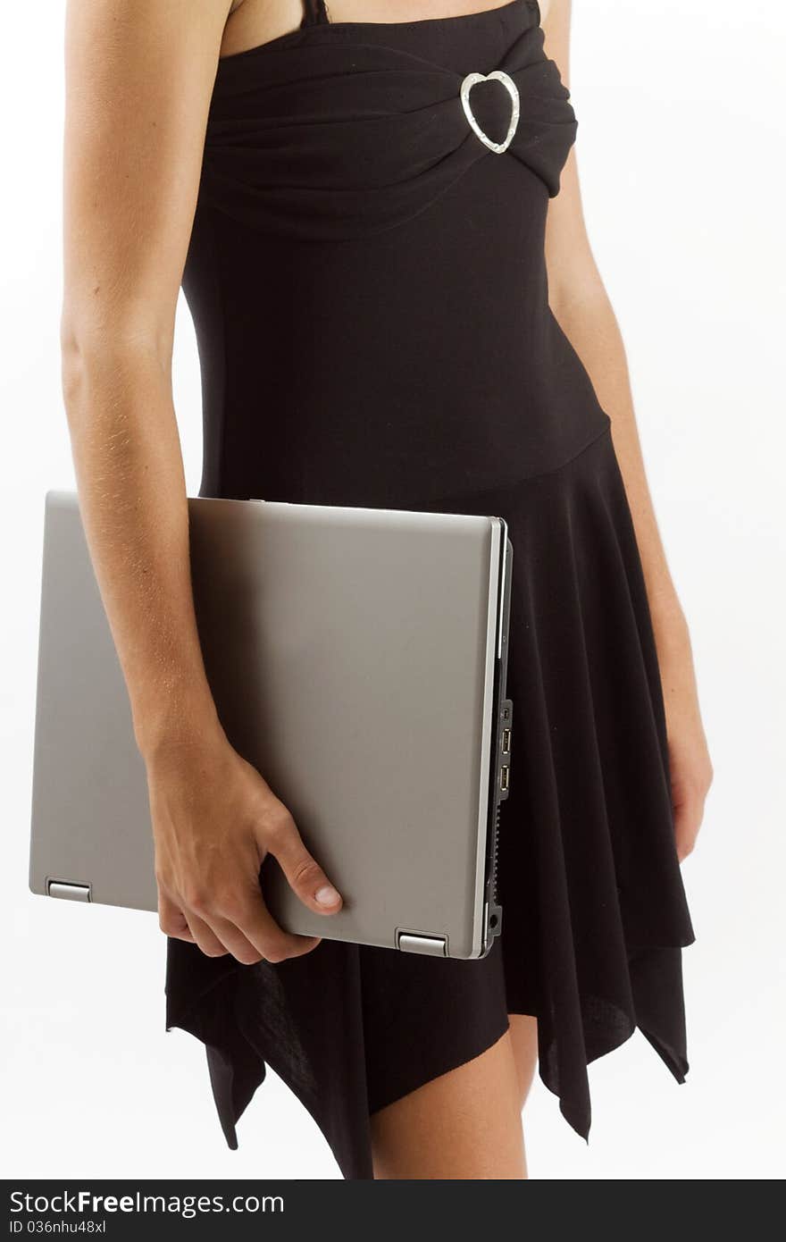 Stylish Woman Holding A Laptop By Her Side