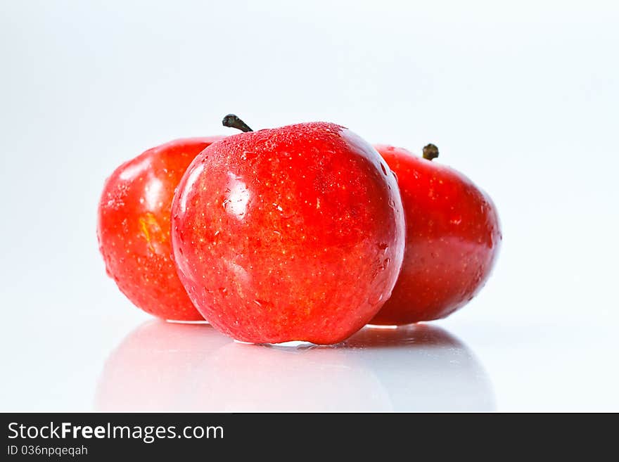 Fresh red apple on white background