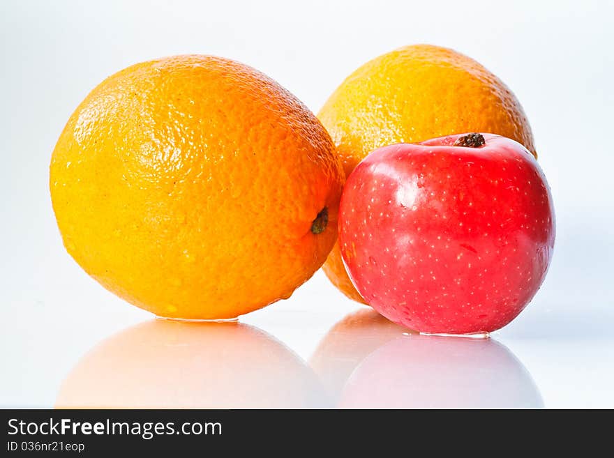 Food Related: Apples and Orange Isolated on a White Background