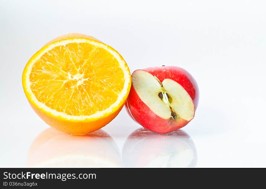 Food Related: Apples and Orange Isolated on a White Background