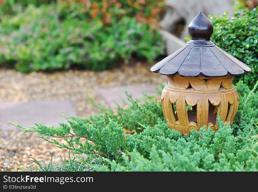 Mini garden decoration with pottery.