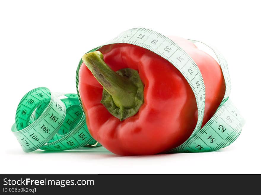 Bulgarian pepper and centimeter, white background, isolated