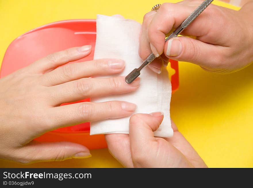 Procedure of manicure is photographed close-up