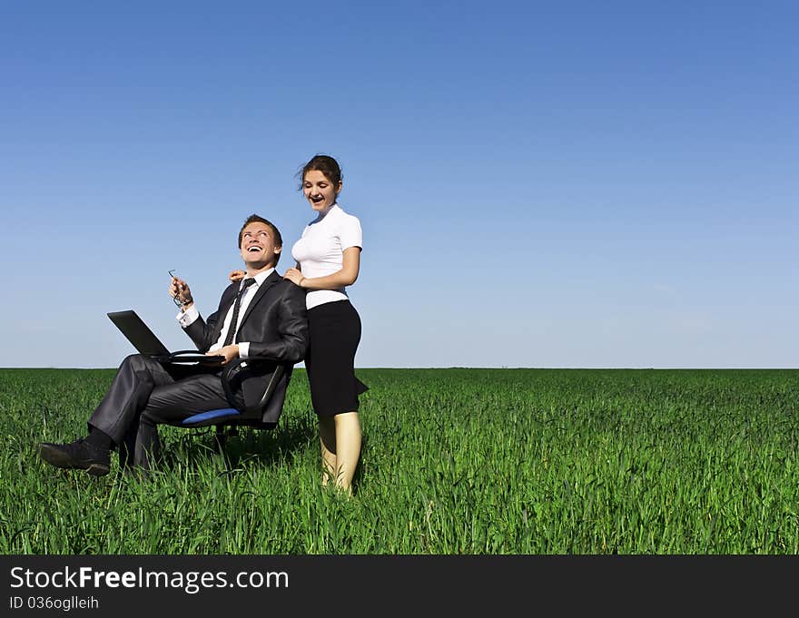 Businessmen At The Meeting. Working On A Laptop