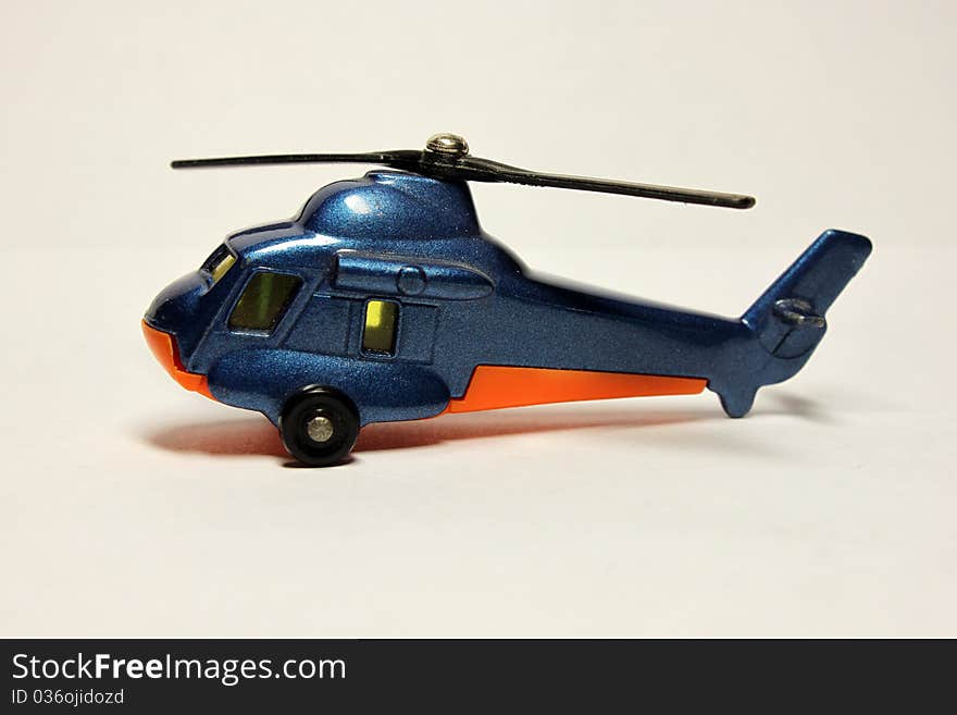 Toy helicopter on a white background