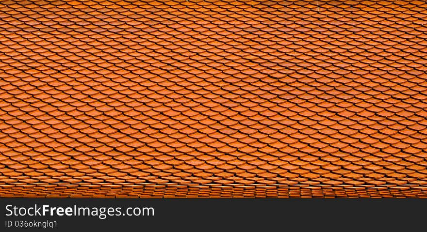 Buddhist temple's orange tile roof. Buddhist temple's orange tile roof