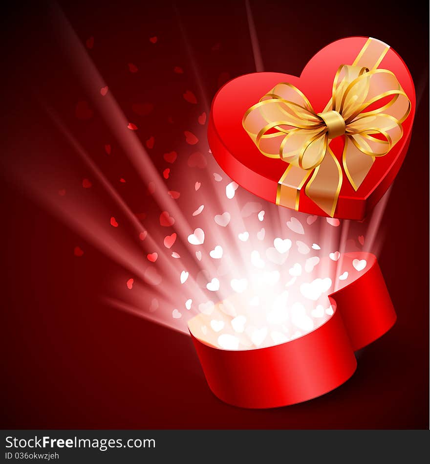 Red heart shape gift with light from inside