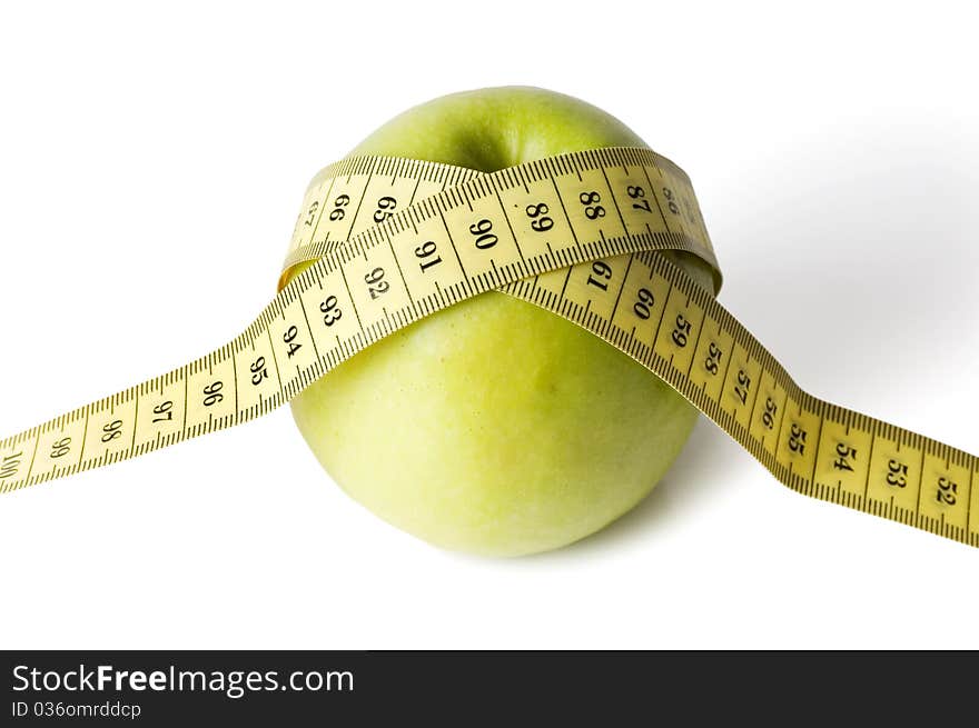 Green apple with tape isolated on white background