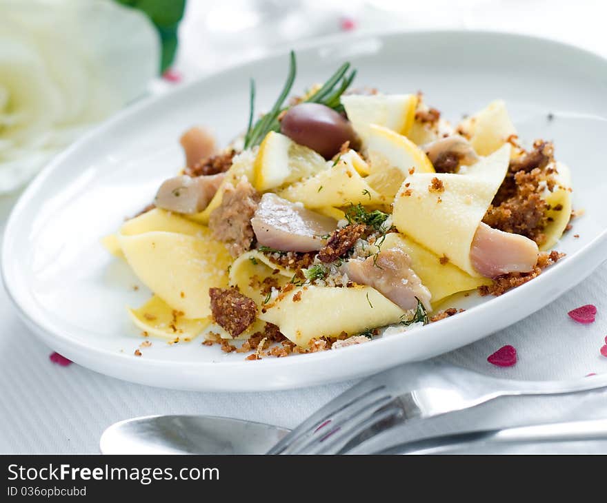 Pasta with tuna and lemon served for dinner