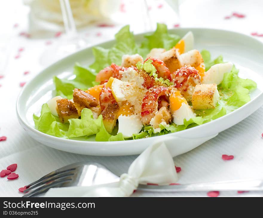 Fresh salad with shrimp and egg for appetizer