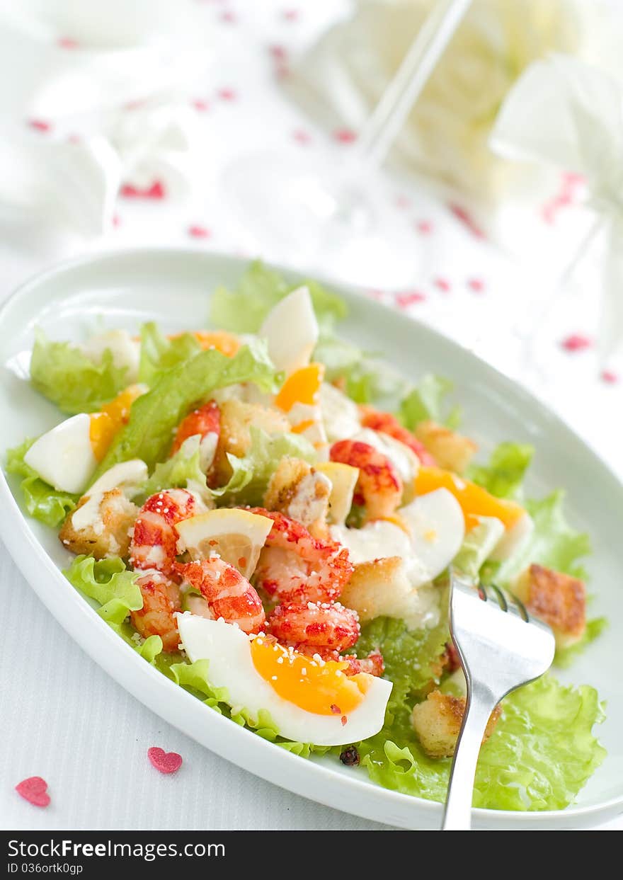 Fresh salad with shrimp and egg for appetizer