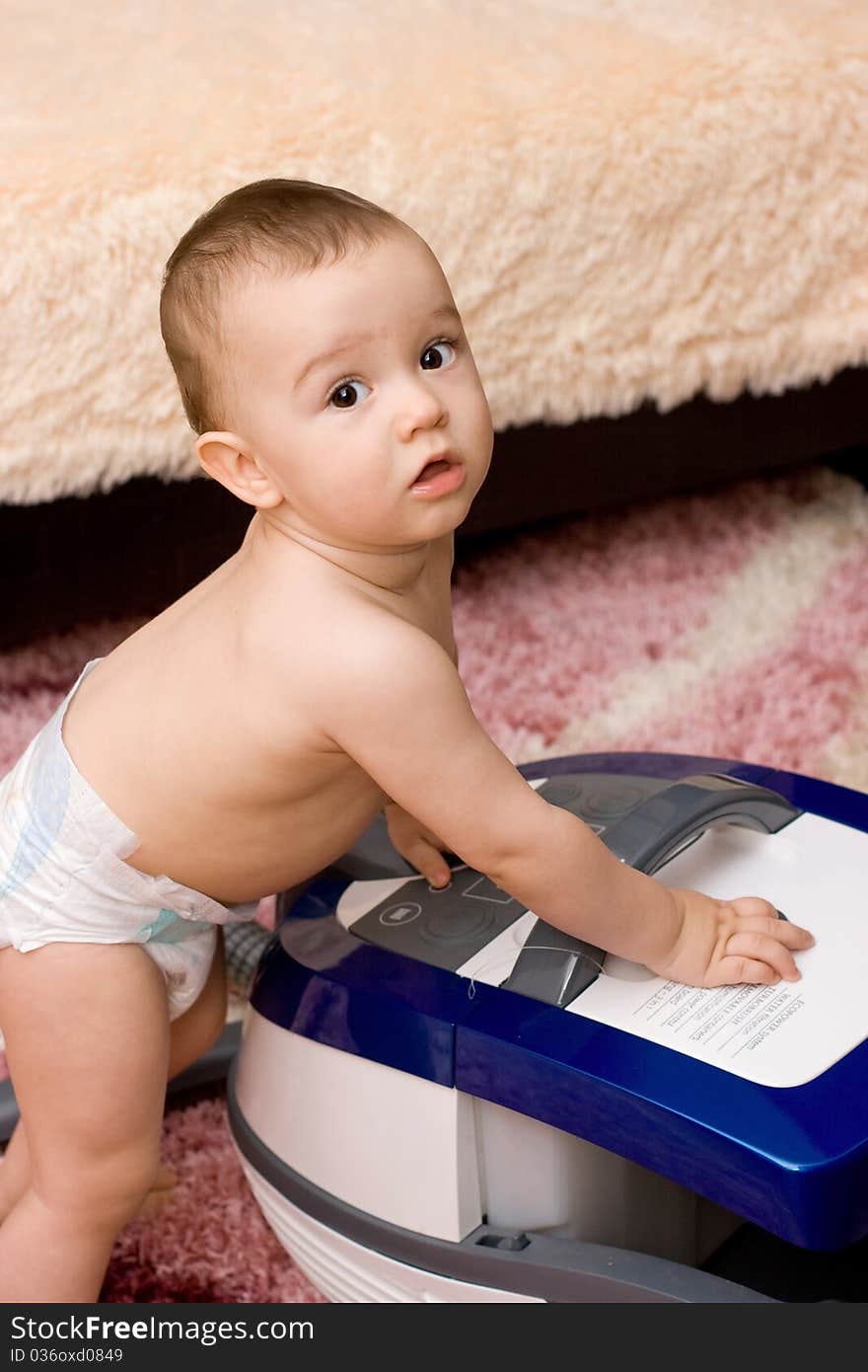 Cute Baby With Vacuum Cleaner