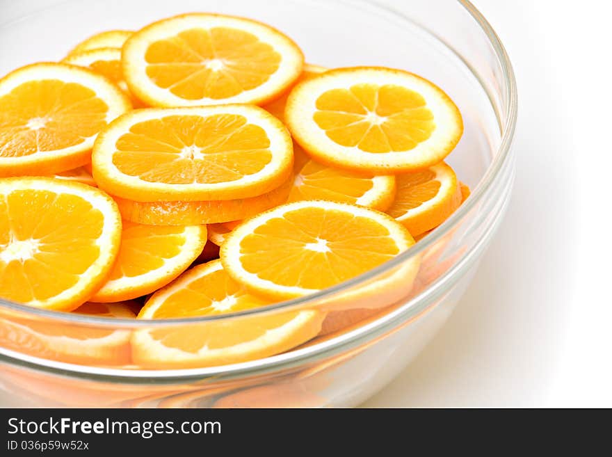 Orange slices in glass bowl